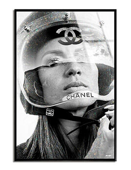 Black and white portrait of a woman with a motorcycle helmet with a french fashion brand logo on it